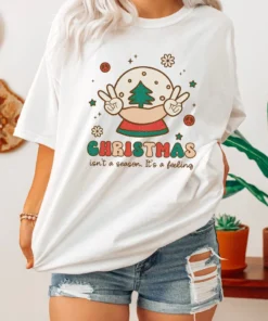 Christmas Isn't A Season it's a feeling T-Shirt